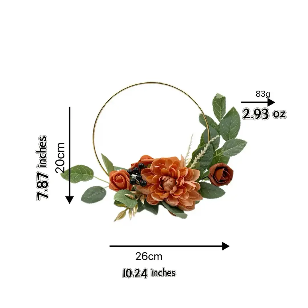 Boho floral hoop wreath with terracotta peonies, rosebuds, and green foliage on a gold ring