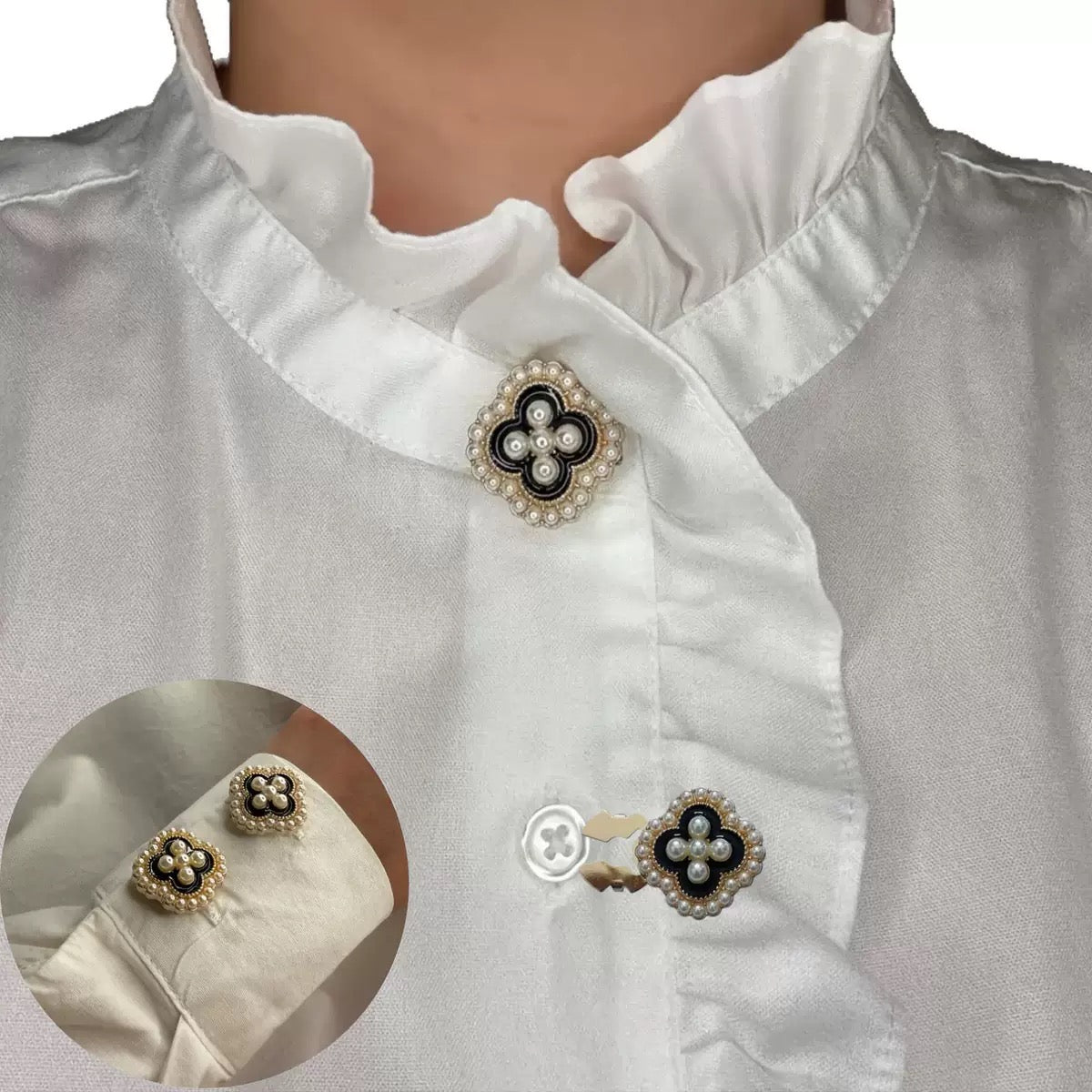 Pearl clover button cover set shown on a white ruffled blouse